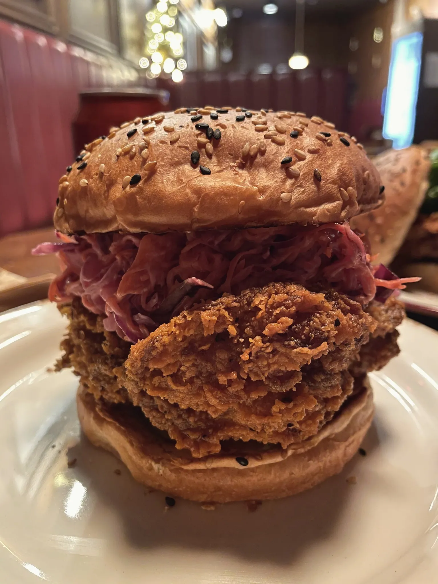 A pastrami sandwich on a plate at a diner in Seoul